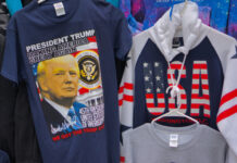 Trump T-shirt and USA hoodie display in store.