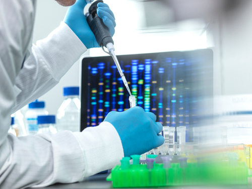 Scientist conducting a DNA test in a laboratory.