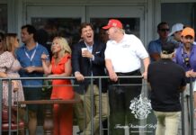 Group of people at Trump National Golf Course event.