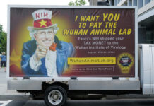 Fauci’s Top Scientist REFUSED the Vaccine – Shocking Reason… A van with an anti-NIH billboard featuring Anthony Fauci.