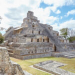 DEVELOPING: Tourists Massacred At Ancient Pyramid… Ancient stone pyramid structure with stairs under a blue sky.