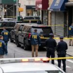 Crime Data MANIPULATED — Feds Uncover Shocking Deception… FBI agents and police officers at a crime scene with police tape