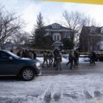 Packers Star’s SHOCKING Arrest: Disturbing Abuse Allegations! Law enforcement officers in tactical gear at a crime scene surrounded by police tape