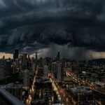 $50 Billion Disaster Brewing Beneath Pacific Waters… Dramatic storm clouds over a city skyline with rain in the distance