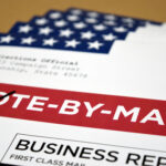 Vote-by-mail envelopes with American flag design