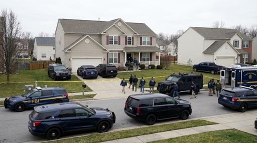 Fbi,Swarming,A,Home FBI agents conducting an operation in a suburban neighborhood