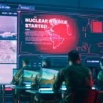 Gas Price Shock Looms After Trump Move Military personnel monitor a command center screen showing missile launch alerts