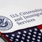 Illegal Immigrant, Gun Fight, ICE Moves U.S. Citizenship and Immigration Services document with American flag