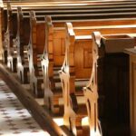 Bride-To-Be Torches Church—$100K Blaze wooden church pews in sunlight