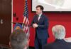 Jim Jordan Pleads Ignorance—The Record Explodes Man in suit speaking at a podium in a conference room