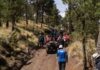 rescue team with ATVs on a forest trail
