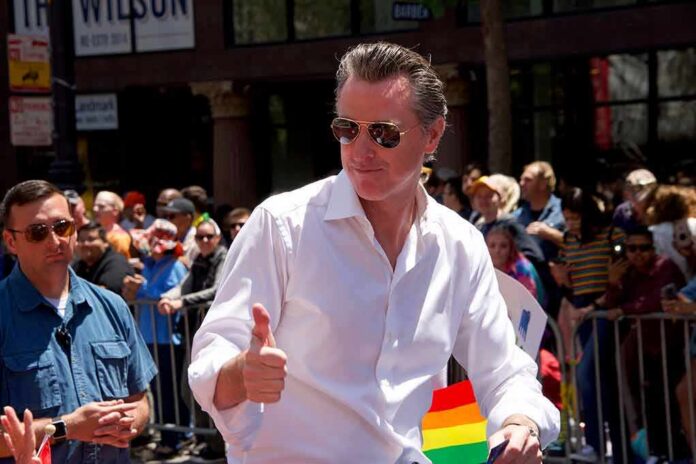shutterstock_1442483177 Man in white shirt giving thumbs up at a pride parade