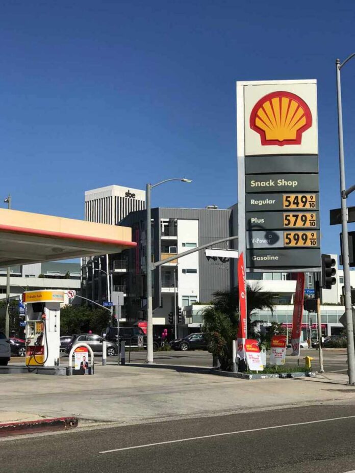 Shell gas station with price sign on a sunny day