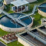 EPA Showdown Over ‘Abortion Water’ Claims Wastewater treatment plant with circular clarifiers and aeration tanks