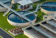 EPA Showdown Over ‘Abortion Water’ Claims Wastewater treatment plant with circular clarifiers and aeration tanks