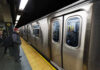 Subway Worker Opens Closet and Finds Body Subway train at platform with passengers inside and man waiting