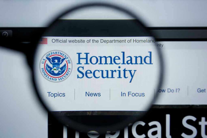 1454623841 Magnifying glass showing Homeland Security website.