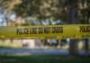 Intuitive Healer Makes Chilling Murder Admission yellow police tape cordoning off an outdoor area