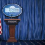 Trump’s Birthright Citizenship Bombshell Shakes DC White House press briefing podium with U.S. flag and blue curtain