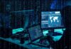 Pentagon Raid Drains Billions—What Got Slashed? cybersecurity analysts at workstations with code and world map on screens