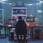 US and UK Sign Fusion and AI Deal People working at computers in a dim server room