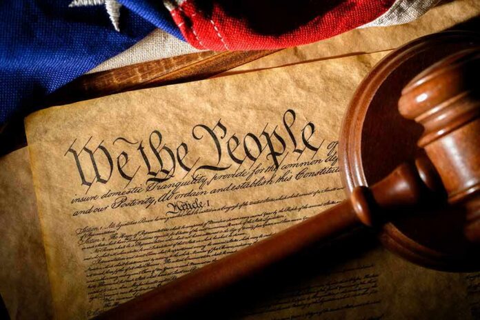 shutterstock_1650343750 U.S. Constitution with gavel and flag