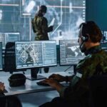 Secret Service Meltdown Exposed Military analysts at computers in a command center