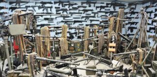 Room filled with machine guns and ammunition belts