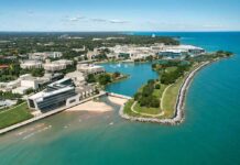 Billionaire Drops Record $3 BILLION University Gift aerial view of a lakeside university campus with lagoon and curved shoreline