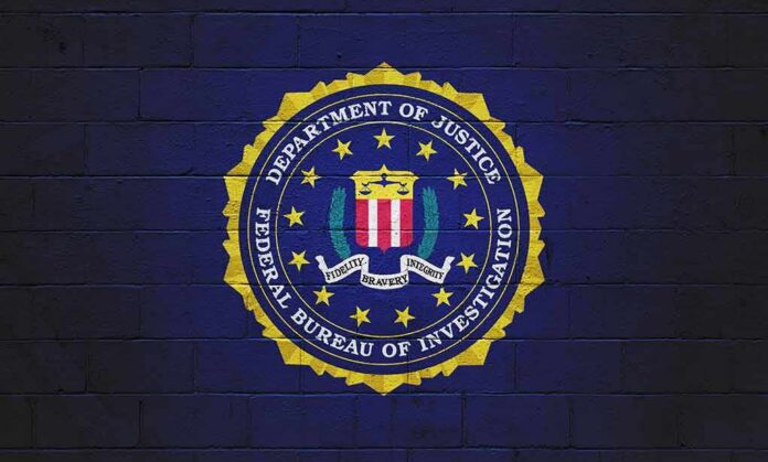 FBI seal painted on a dark brick wall