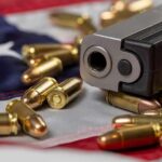 Handgun with bullets on an American flag