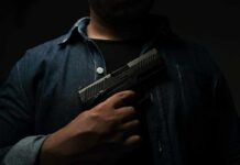 Gas Station Robbery Goes VERY Wrong person holding a handgun against chest