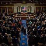 Republican Senators Cave to Dems: Vote For $700B in Untraceable Grant Spending Legislative chamber audience stands and applauds