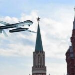 Thousand-Drone Barrage Hammers Moscow military drone flying near ornate red-brick towers