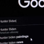 Hunter Biden Launches ‘$LAPTOP’ Meme Coin computer screen showing a search engine query with suggestions
