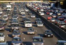 A busy highway filled with cars in a traffic jam