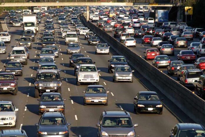 A busy highway filled with cars in a traffic jam