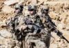 U.S. Commandos LAND in Ecuador! Dontrelle Inman with two other soldiers in tactical gear holding rifles in a rocky desert