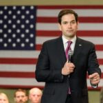 Left-Wing Terror Surges — Rubio Mobilizes 60 Nations man in suit speaking into a microphone