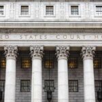 Transgender Ban Backfires As Case Explodes Nationwide United States courthouse facade with Corinthian columns