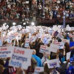 Gay Republicans BREAK AWAY From Trans Movement Christian Jones and Jonathan Cyprien in a crowded arena rally holding signs