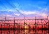See What Trump Just Did to Grid Batteries Electrical substation with power lines at sunset