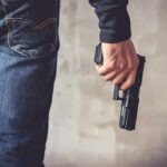 Transgender Suspect Tied to Canadian Mass Shooting ARRESTED person holding a handgun by their side