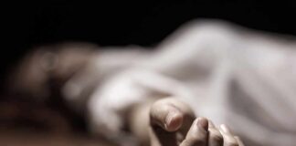 hand of a person lying on the floor