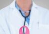 Trump Family Member Beats CANCER Doctor holding stethoscope with pink ribbon in front