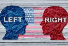 Key Senate Race Turns NASTY in First Debate Blue and red paper head silhouettes facing each other over a faded U.S. flag
