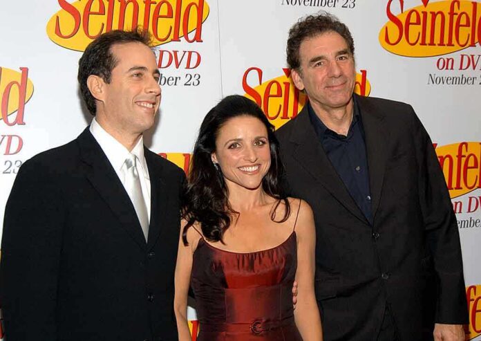 Three actors posing together at a promotional event for Seinfeld on DVD