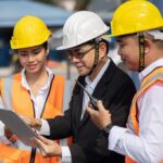 Construction team reviewing a tablet on site