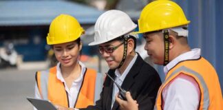 Construction team reviewing a tablet on site