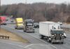 Trump’s Diesel Tax Break Could SAVE You Money Convoy of semi trucks driving on a multi-lane highway